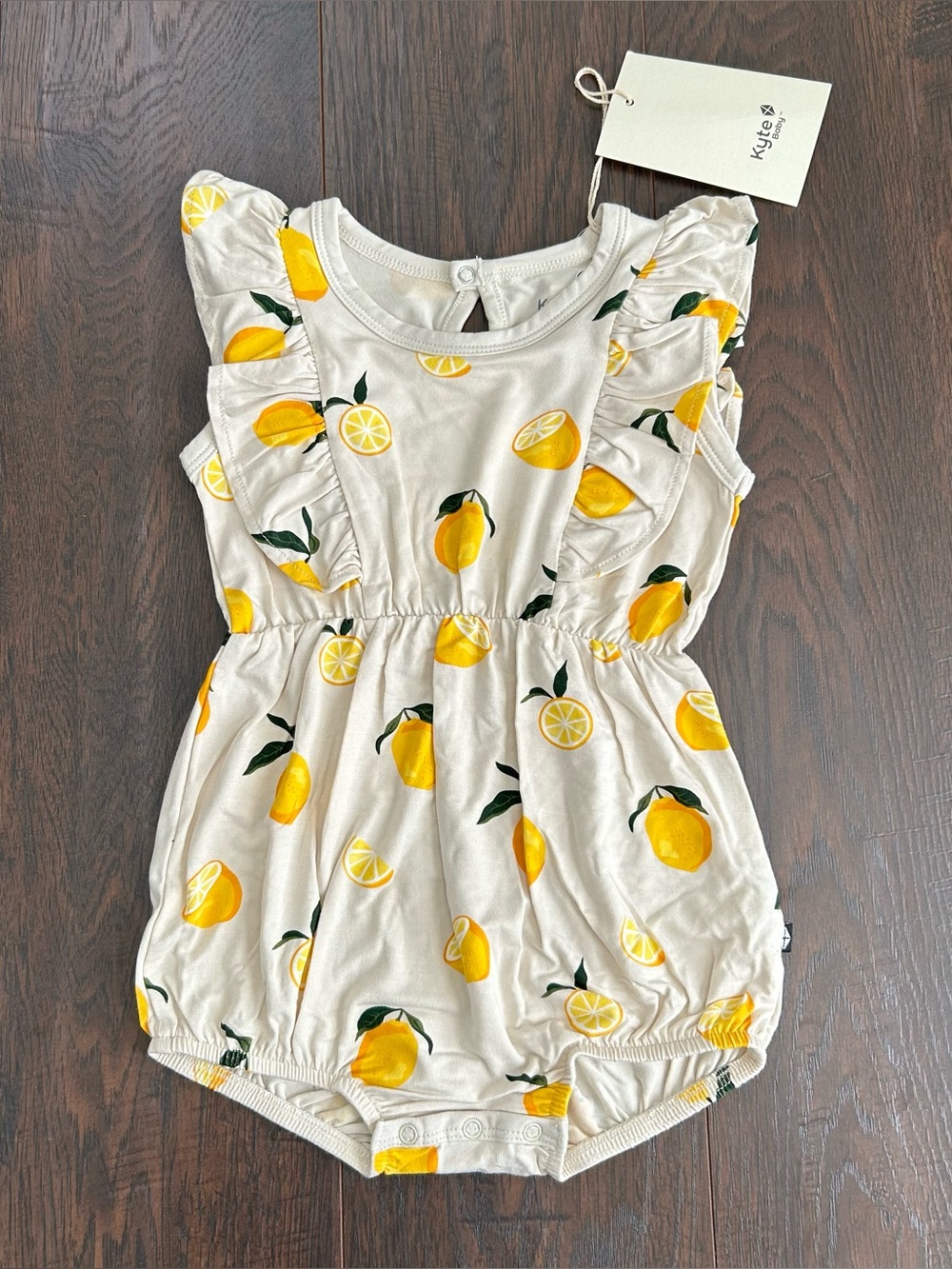 Kyte Short Sleeve Bubble Romper with Ruffles in Lemon 12-18m
